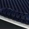 Close up of Morland pass Thru Industrial Rubber Doormat with corner turned back showing grippy backing
