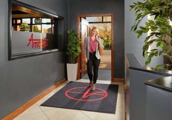 Logo door mat in restaurant entrance